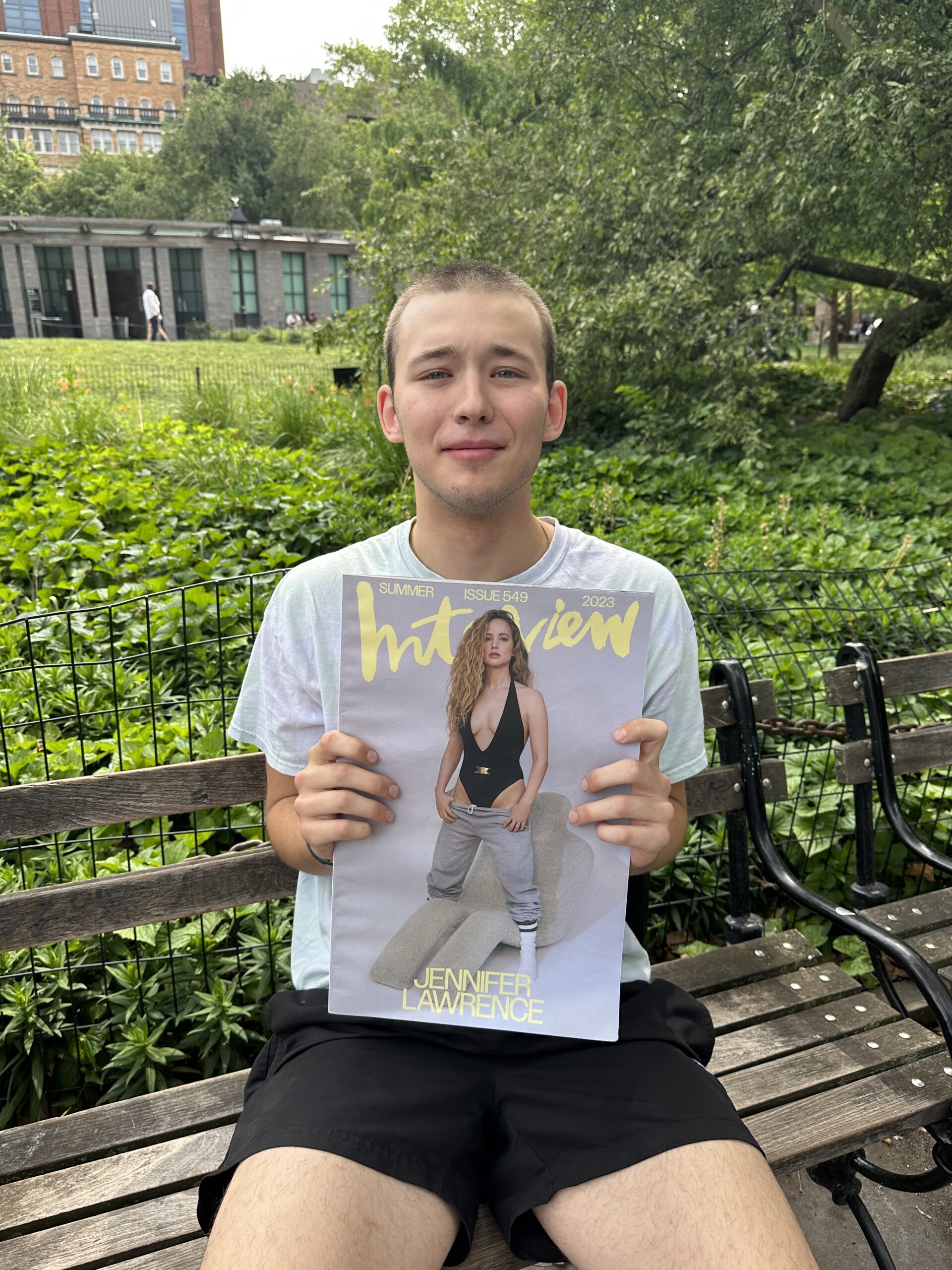 Mateo holds the Jennifer Lawrence cover issue.