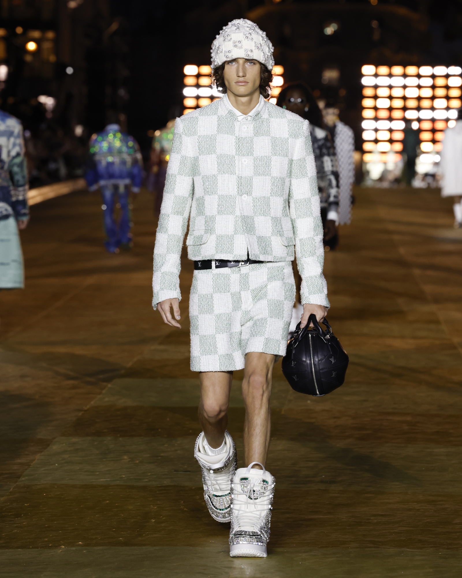 Pharrell Williams' Louis Vuitton Show References Love but Also War