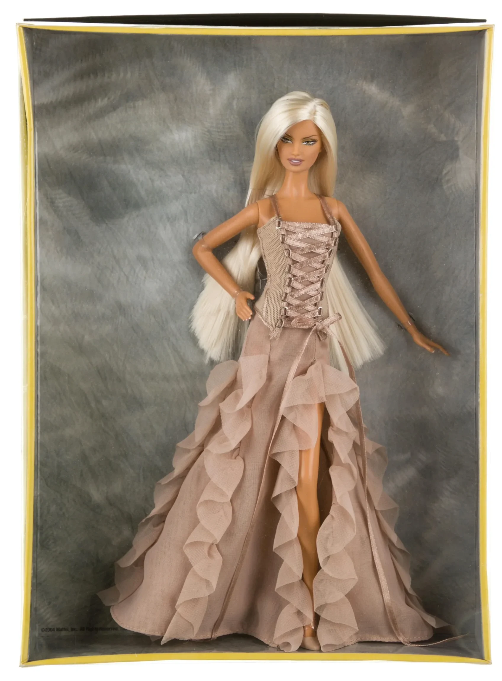 https://www.therealreal.com/products/home/decor-and-accessories/decorative-accents/versace-gold-label-barbie-doll-8728q