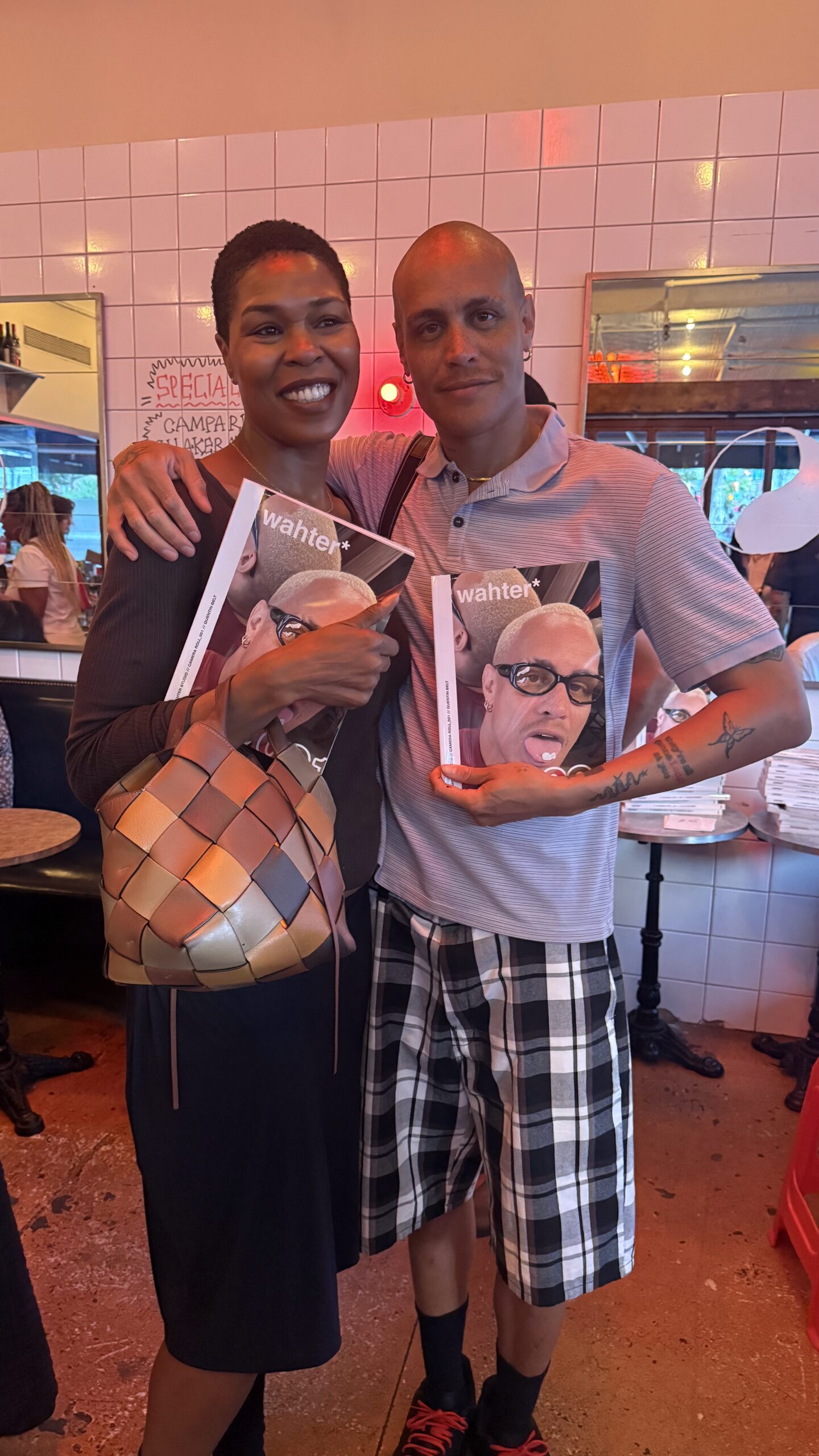 Quentin Belt is holding his book.