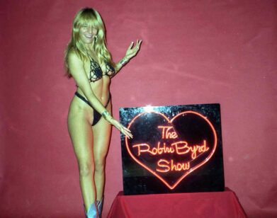 Robin Byrd in her black bikini on The Robin Byrd Show