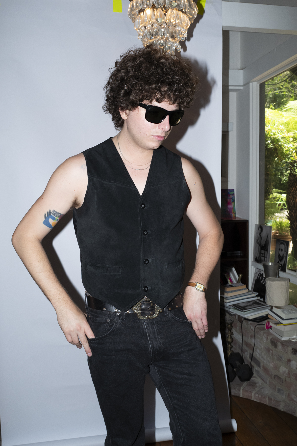Nick Kilven posing in black outfit and sunglasses