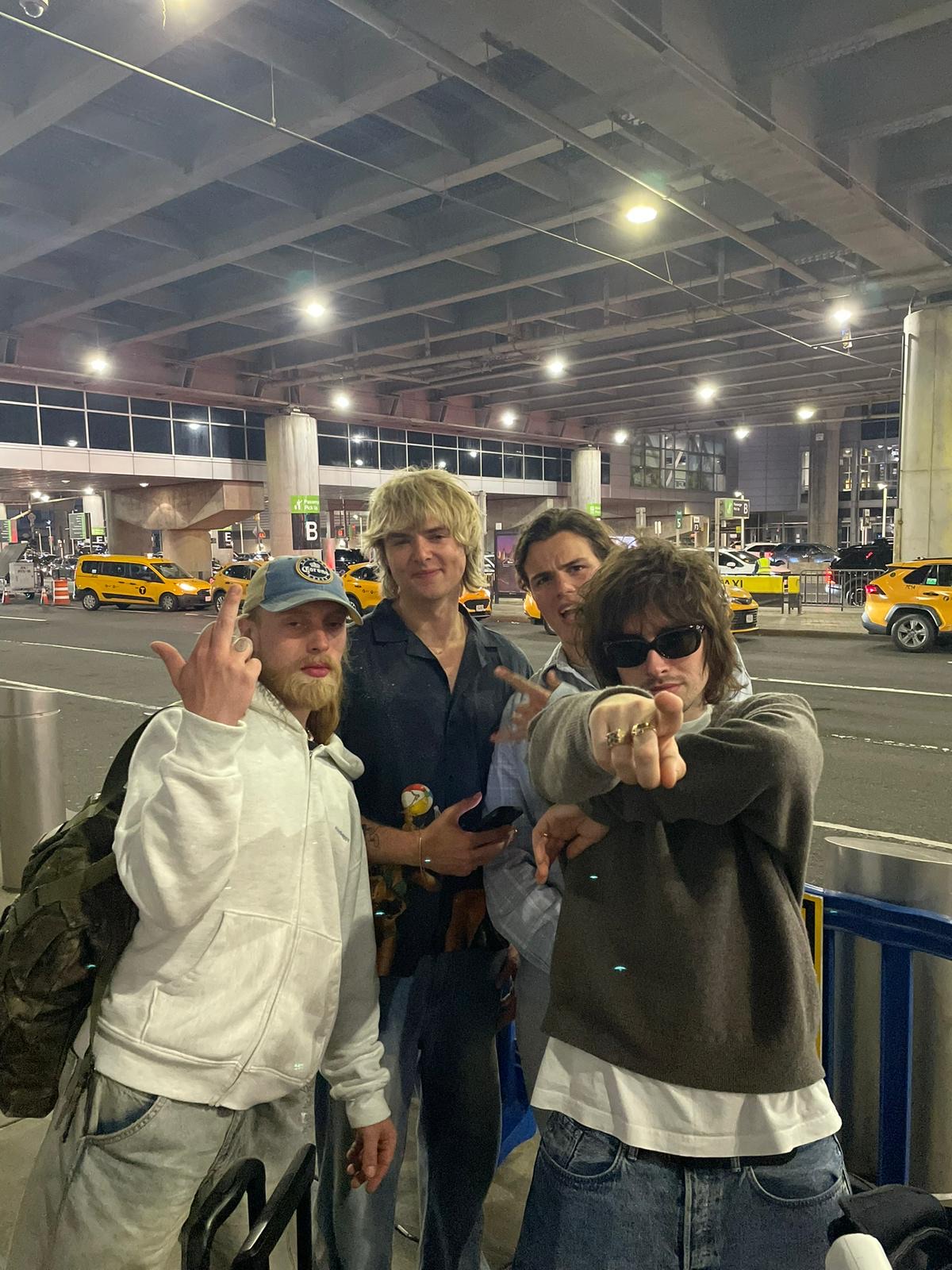 The members of Villanelle pose for a picture at the airport.