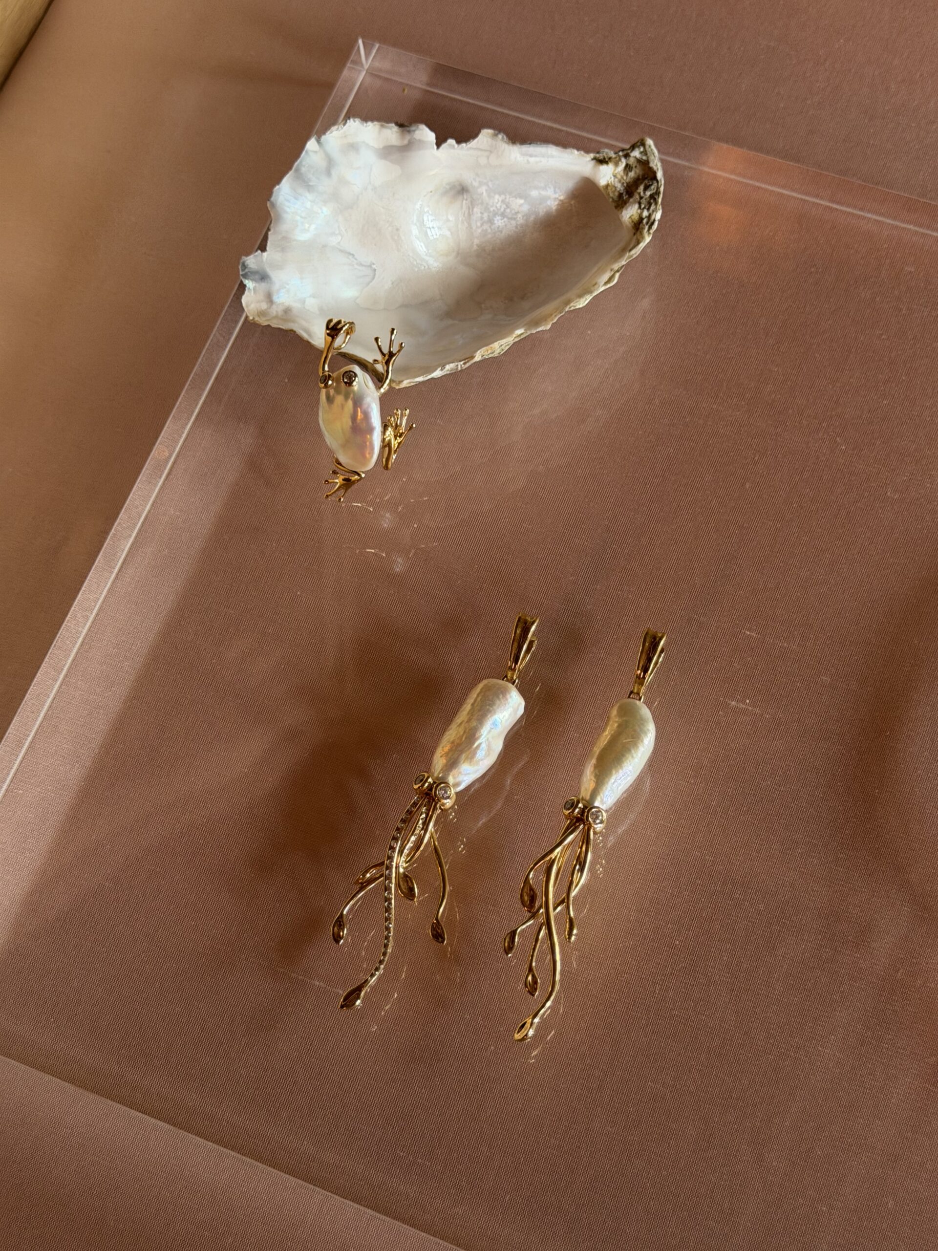 Frog charms and squid earrings