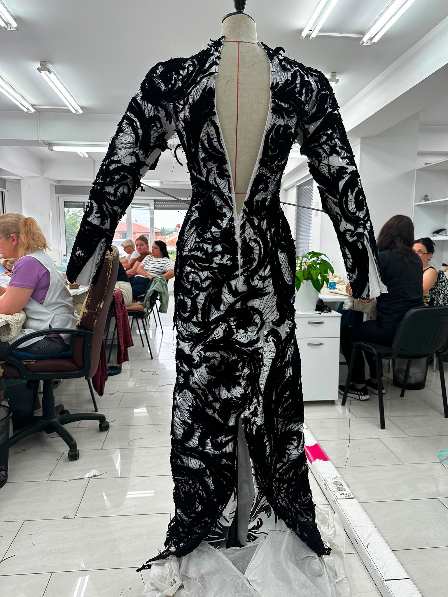The back of a black dress on a mannequin by Duran Lantink
