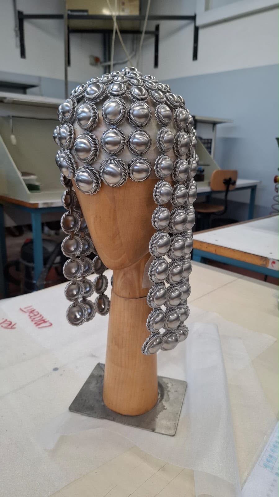 Metal headpiece on a mannequin by Duran Lantink