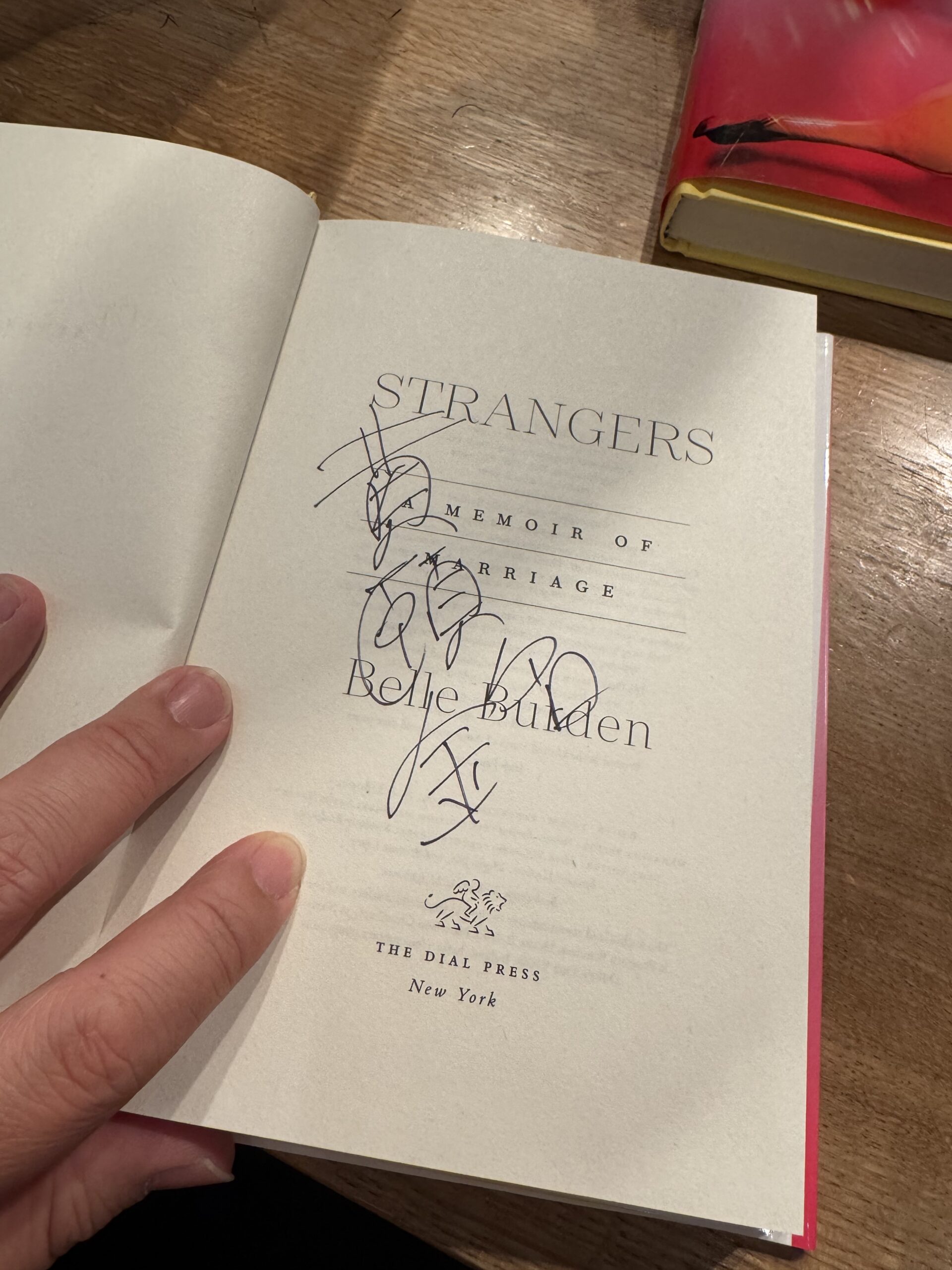 Signed copy of Strangers by Belle Burden.